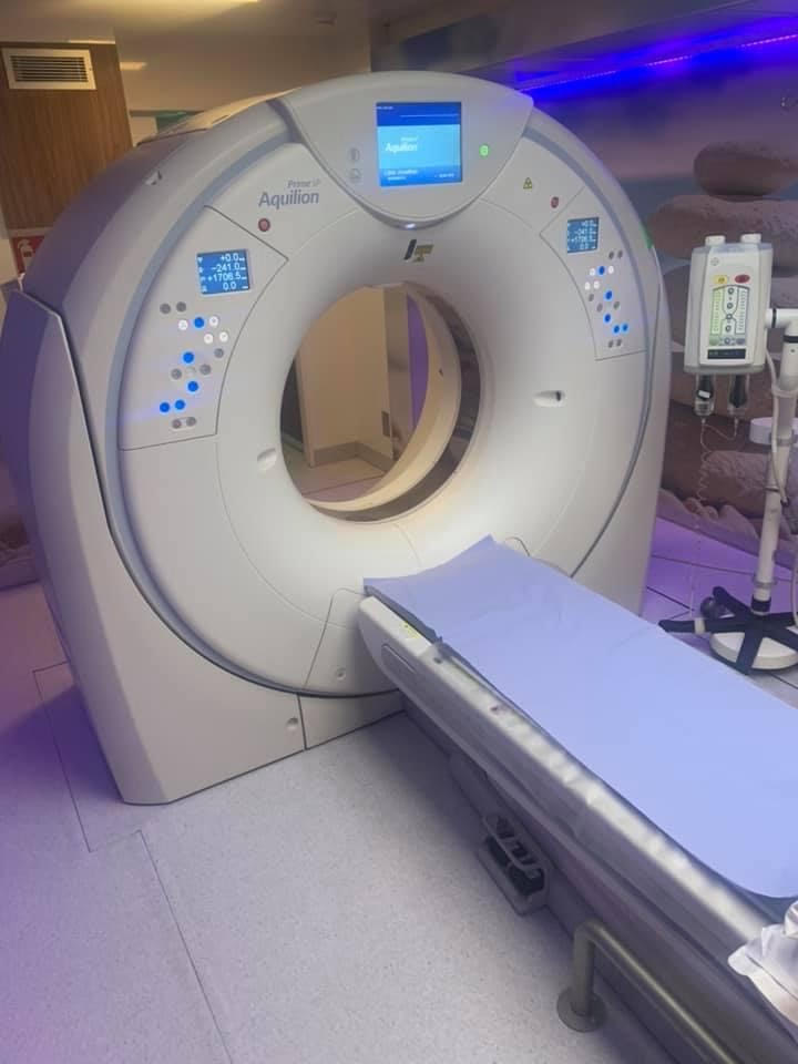 Inside a mobile Canon CT scanning lorry. St Anthony's Hospital, Surrey, England.