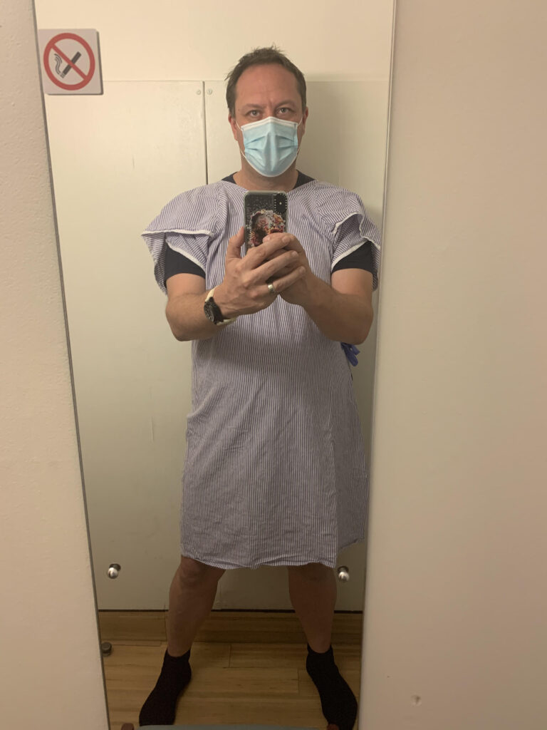 Dressed in a gown for a CT scan